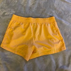 Orange adidas shorts